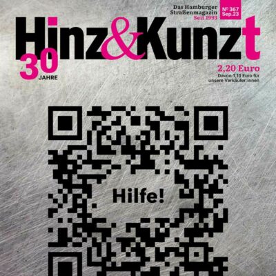 Ein QR-Code mit der Aufschrift "Hilfe!". Titelzeile: "Verloren in der digitalen Welt"