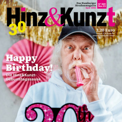 Ein weißhaariger Mann pustet in eine Papiertröte und hält eine 30 in der Hand. Titelzeile: "Happy Birthday!"