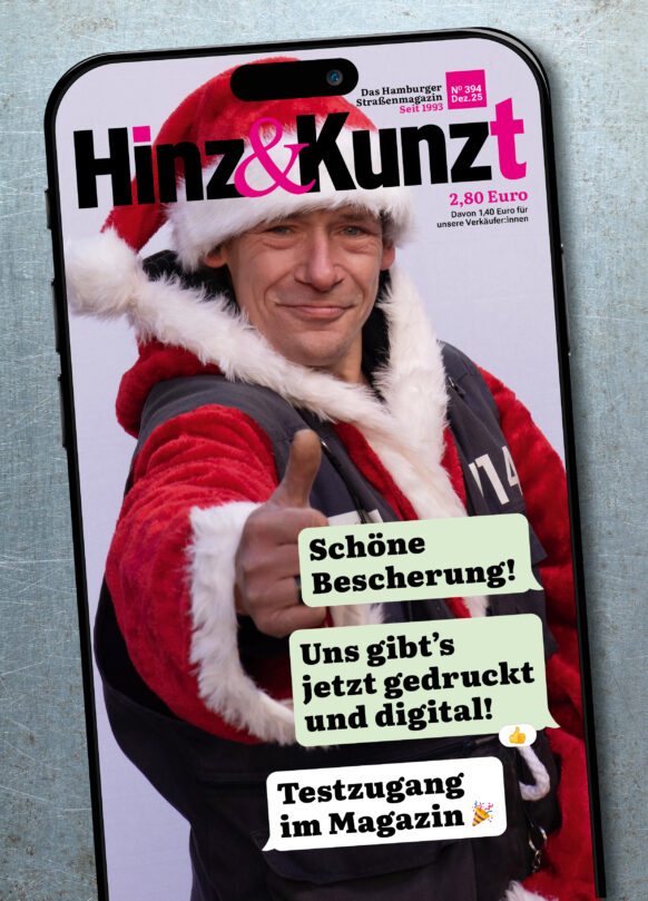 Ein Smartphonebildschirm mit einem Chatverlauf: "Schöne Bescherung! Uns gibt's jetzt gedruckt und digital!" – "Testzugang im Magazin!" Im Hintergrund ein Weihnachtsmann